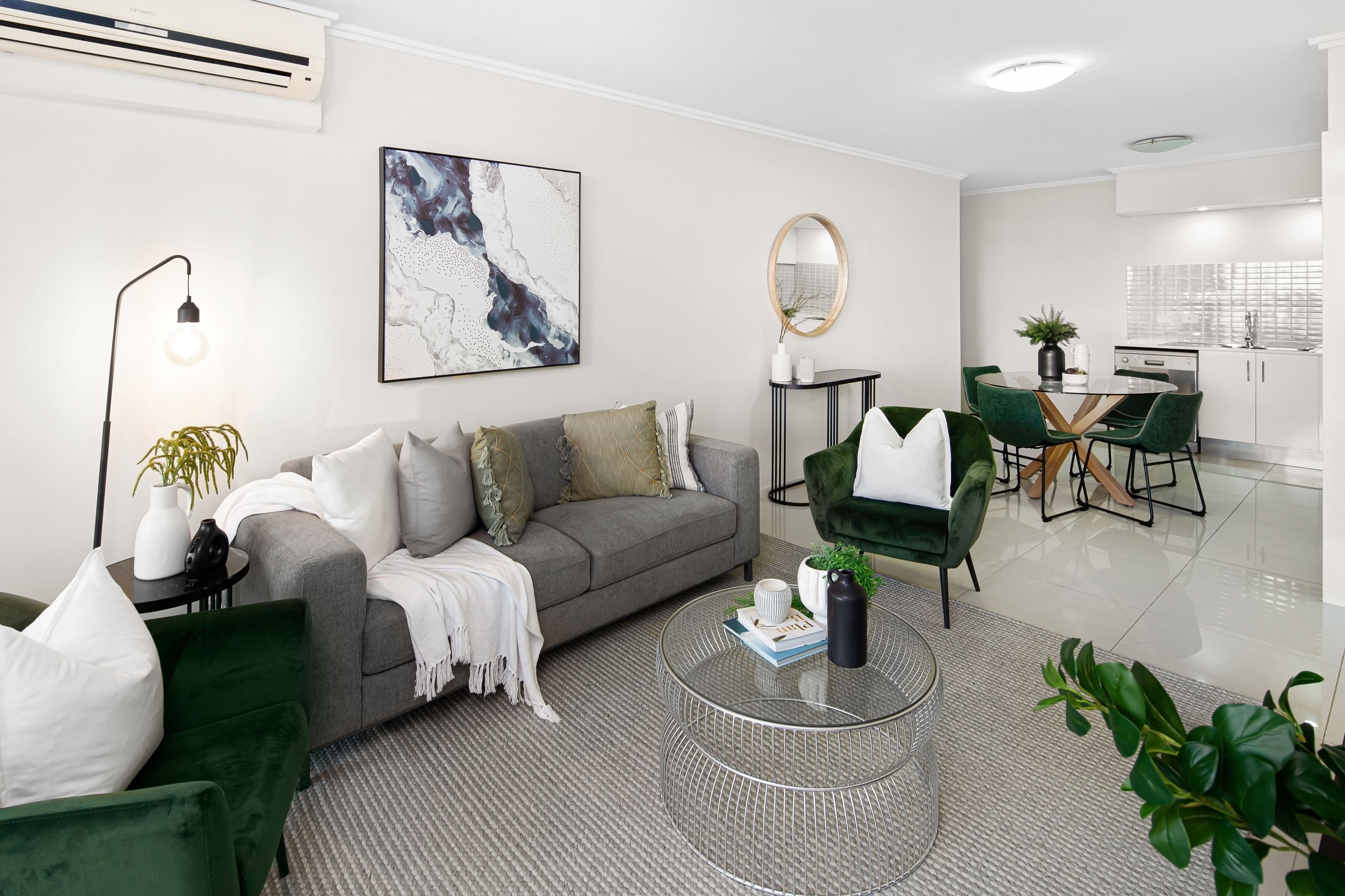 Open-plan living and dining room in a professionally managed HCS serviced apartment
