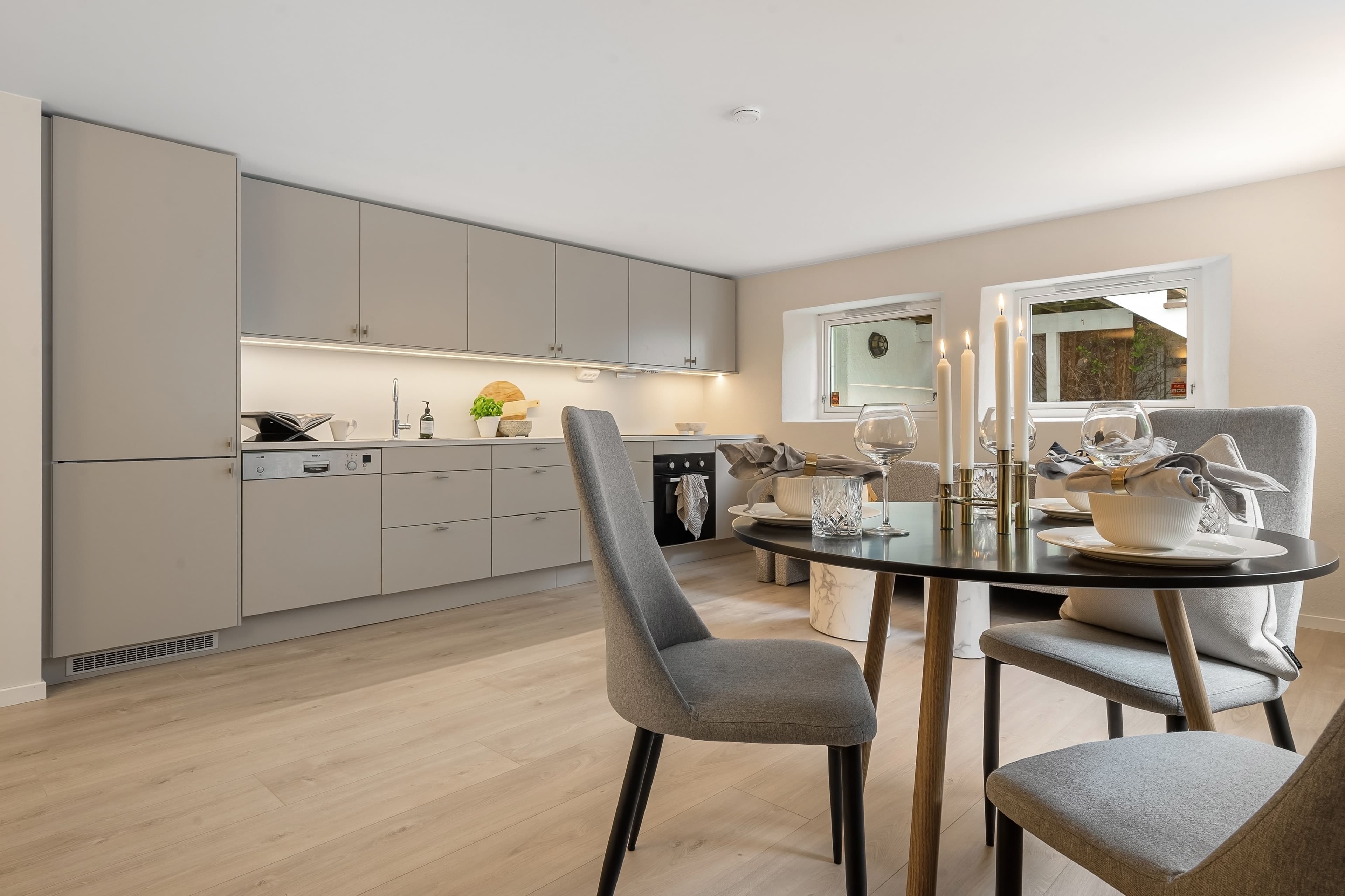 Modern kitchen and dining space styled for a short-let guest stay